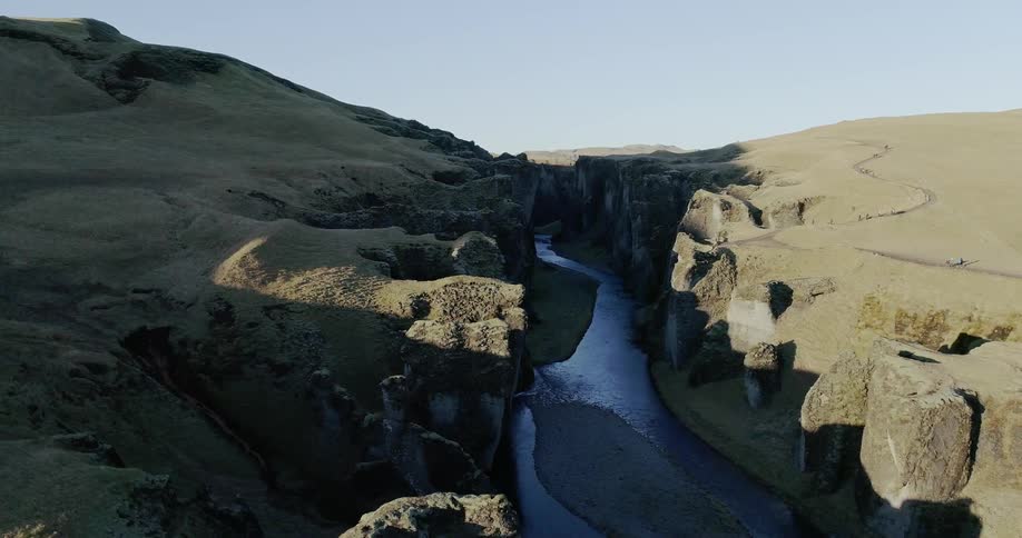 A river runs between a gorge