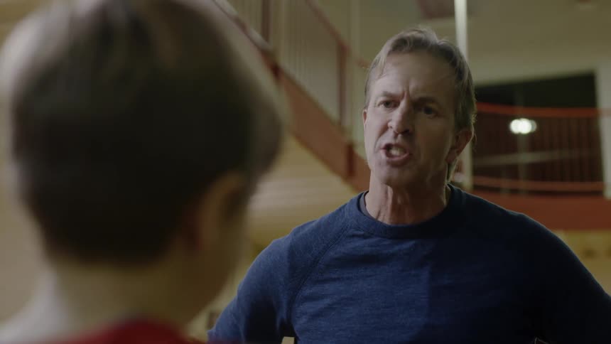 A man is yelling at his young child