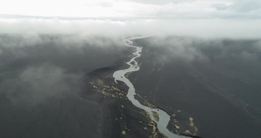 Clouds float above a rural river