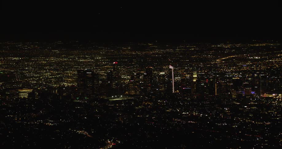 The city is full of brightly lit buildings