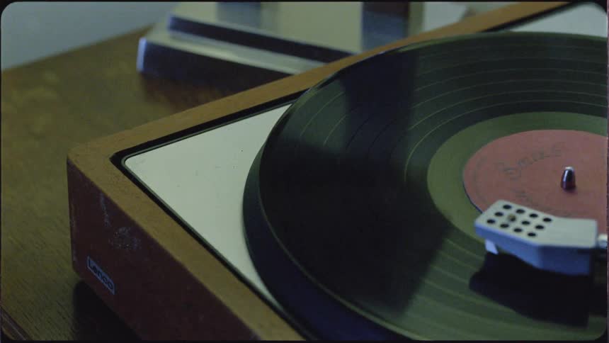 An album spins on a record player