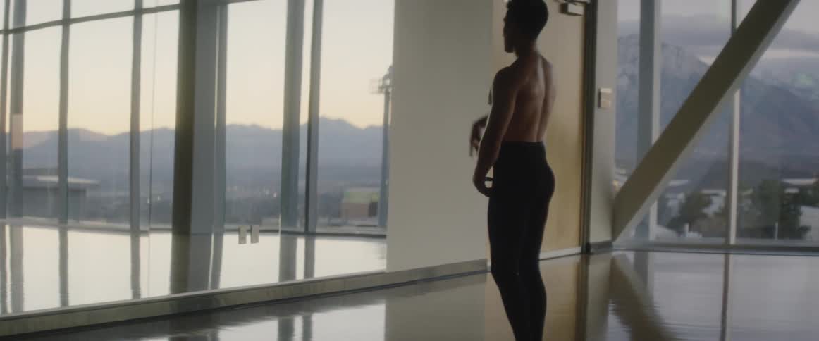 A man does ballet in a dance studio