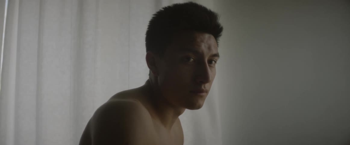 Man looks up and gazes thoughtfully