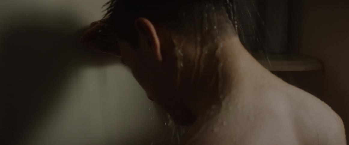 A man takes a shower