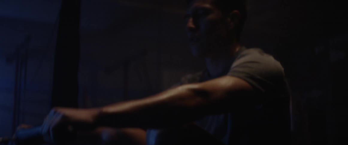 Man uses a row machine