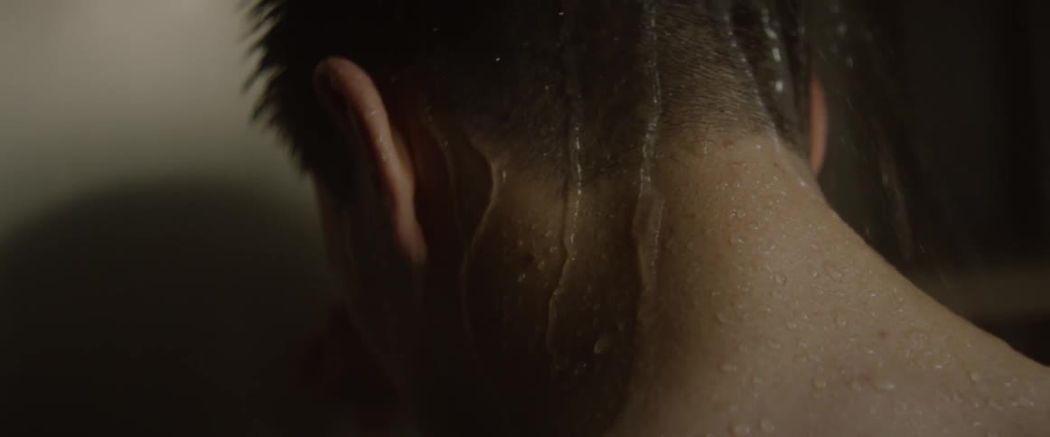A man takes a shower