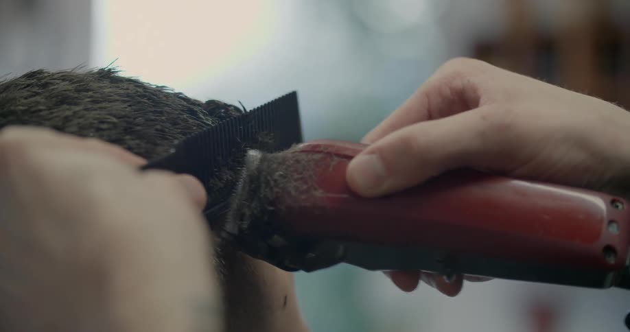 A man is getting a haircut