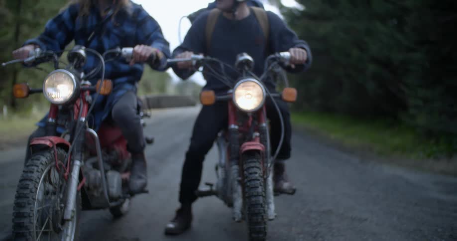 Bikers are biking down the hill