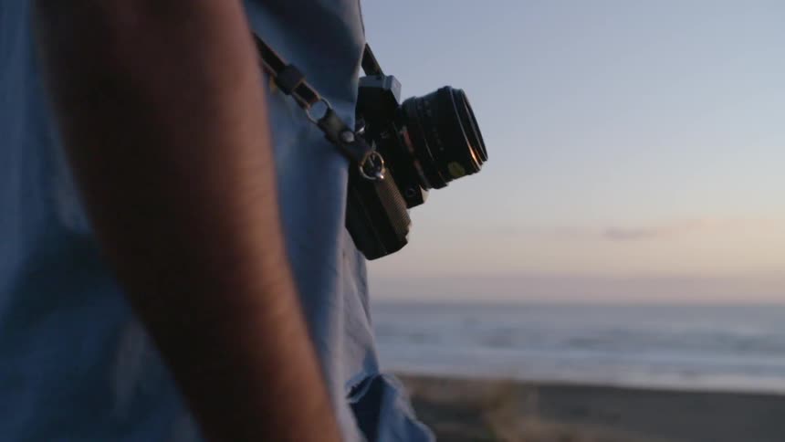 A woman is preparing to take a picture
