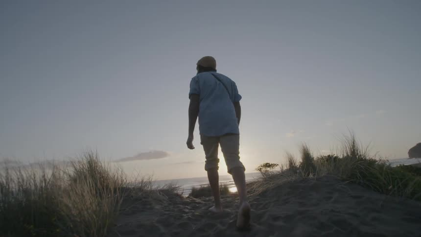 Photographer On Beach