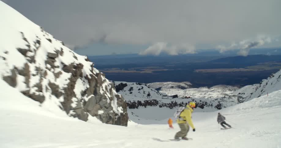 People skiing down a mountain
