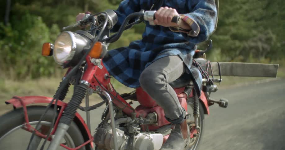 Bikers are biking down the road