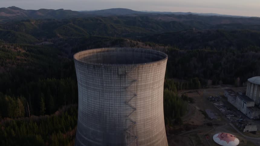 Ascent over a nuclear power plant cooling tower