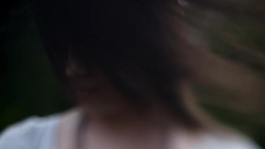 Wind blows through a woman's hair