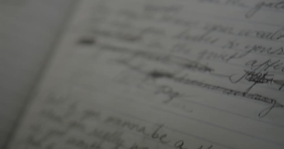Notes are written in a lined notebook