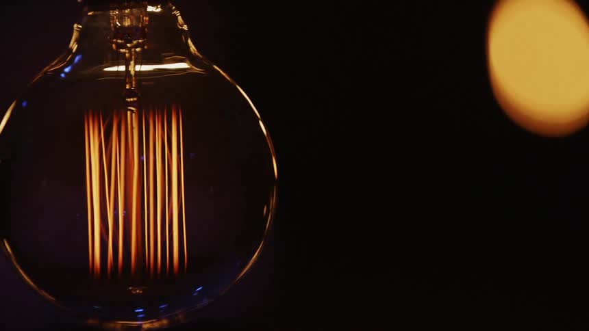Light bulbs flicker while hanging from strings