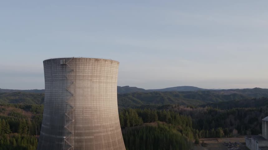 Cooling tower and nuclear facility pullback reveal