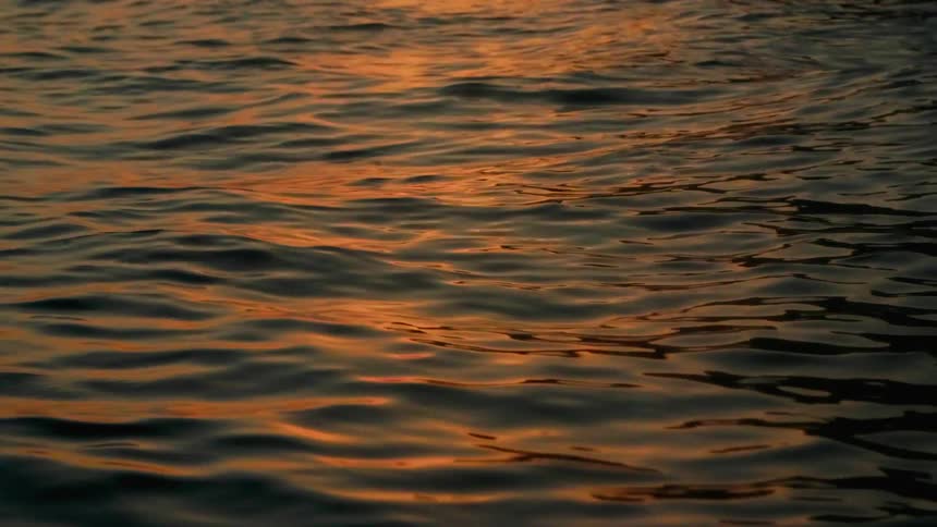 The sun reflects on flowing waters