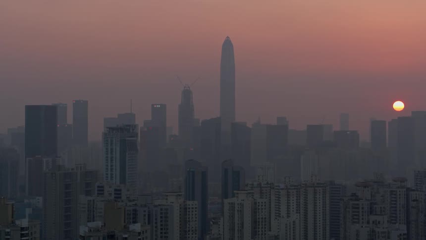 A city skyline at sunset