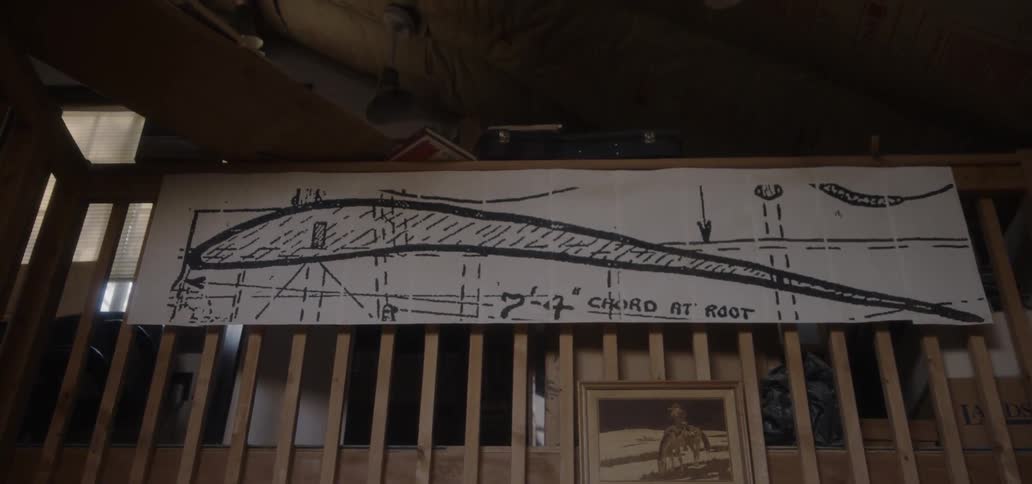 The top of the wall is covered with a blueprint