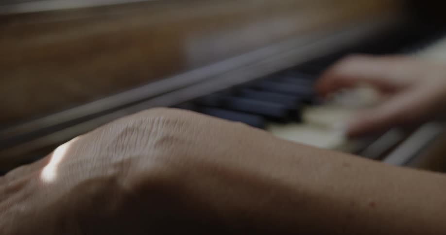 A person is playing the piano