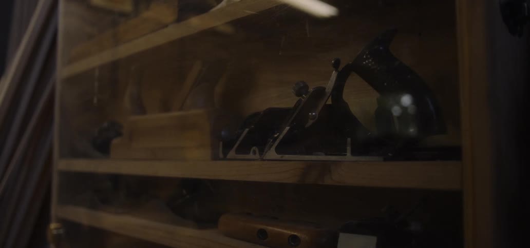 The display case has many tools inside