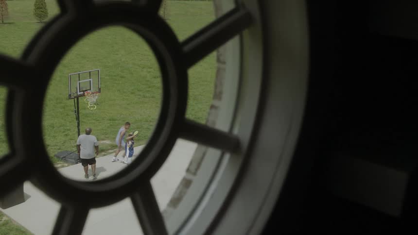 People are playing basketball out the window