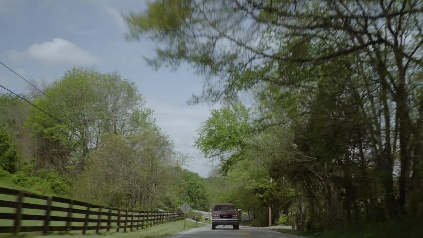 Truck drives on a rural road