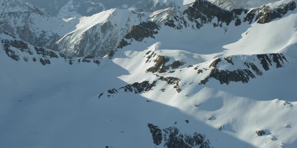 Snow covered mountains on sunny day
