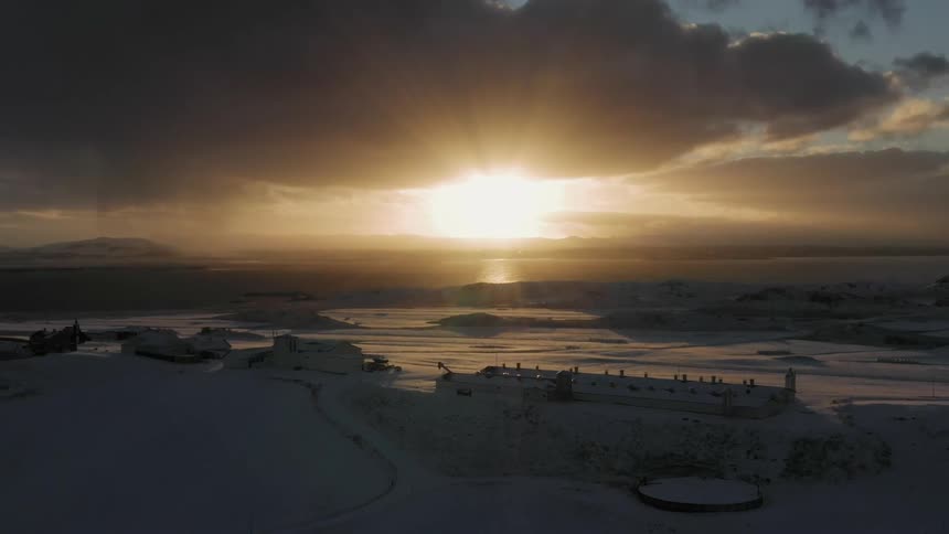 Sun rises from the horizon
