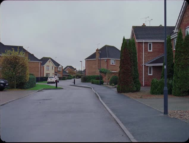 Houses sit in a neighborhood