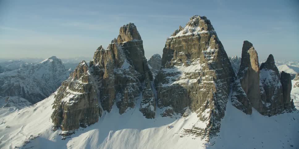 The mountains are tall and lead to more in the distance