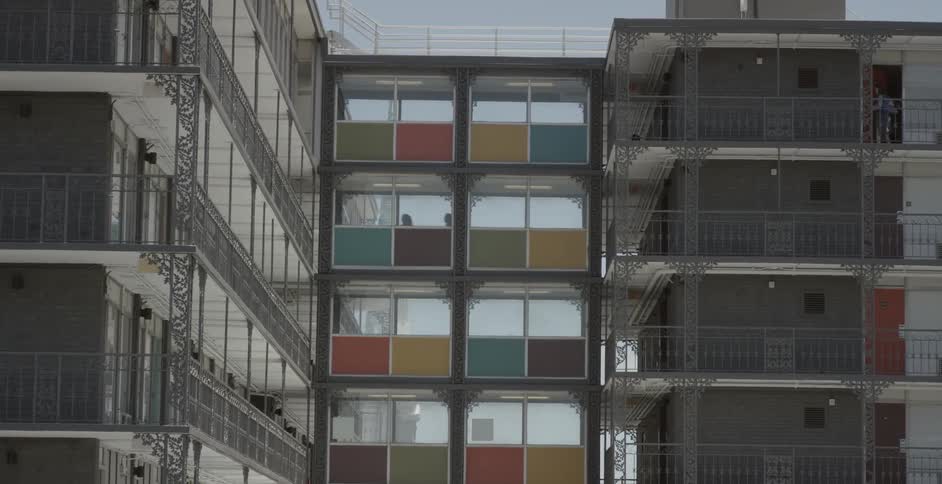 The apartment complex is connected in the middle