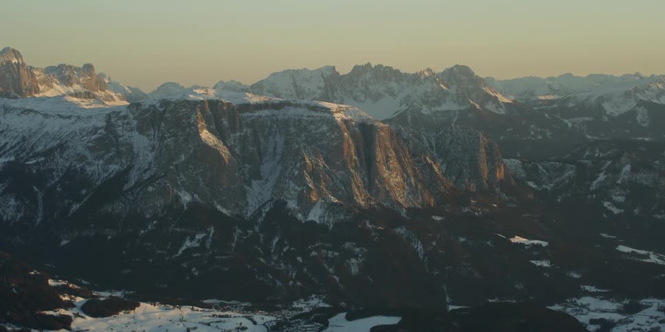 Large mountains partially covered in snow