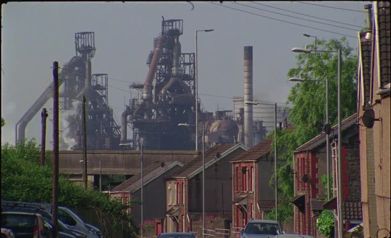 A factory stands in a city