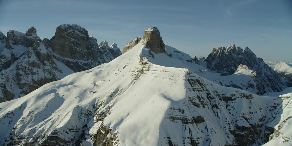 The snow is reaching the top of the mountain
