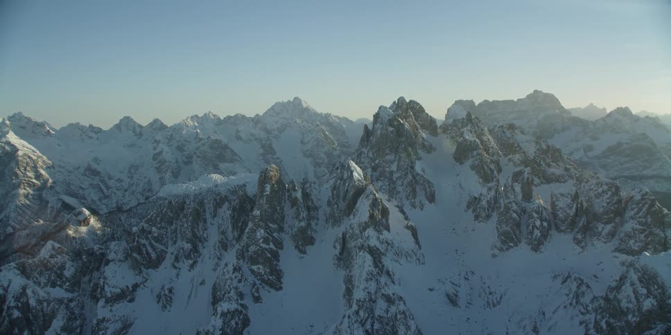 There is a long row of pointy mountains ahead
