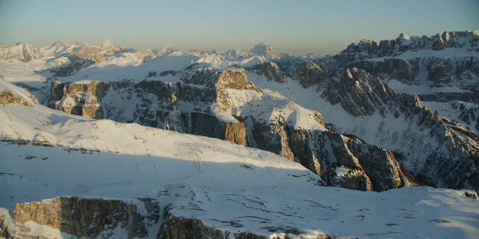 Snow covers a mountain landscape