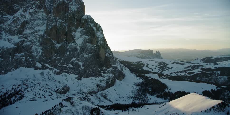 Snow covered mountains at sunrise