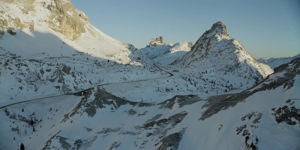 Snow covers the mountain landscape