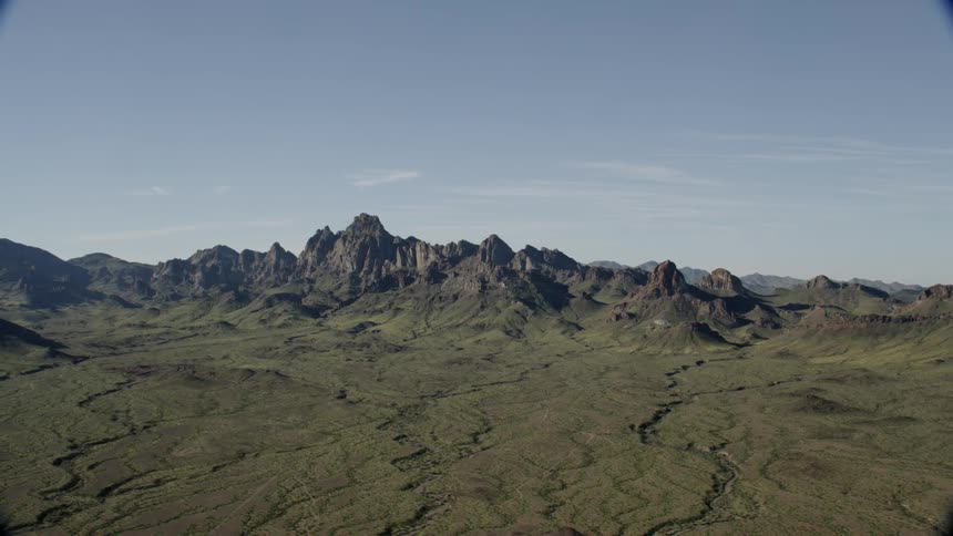 Rocky hills and small paths winding through plains