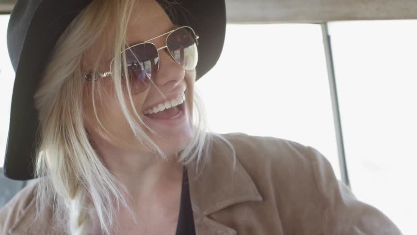 A woman is smiling