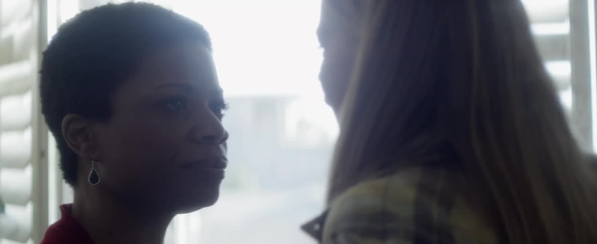 A girl argues with a woman
