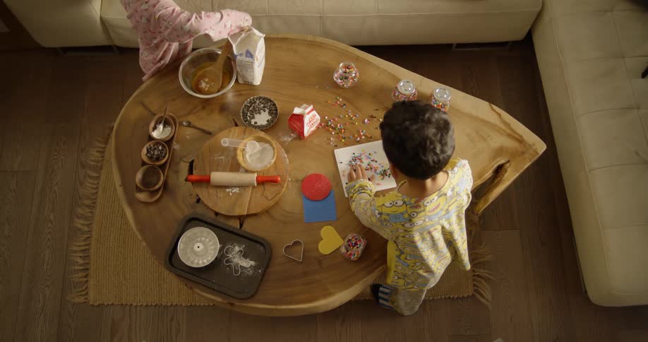 Two children are doing artwork