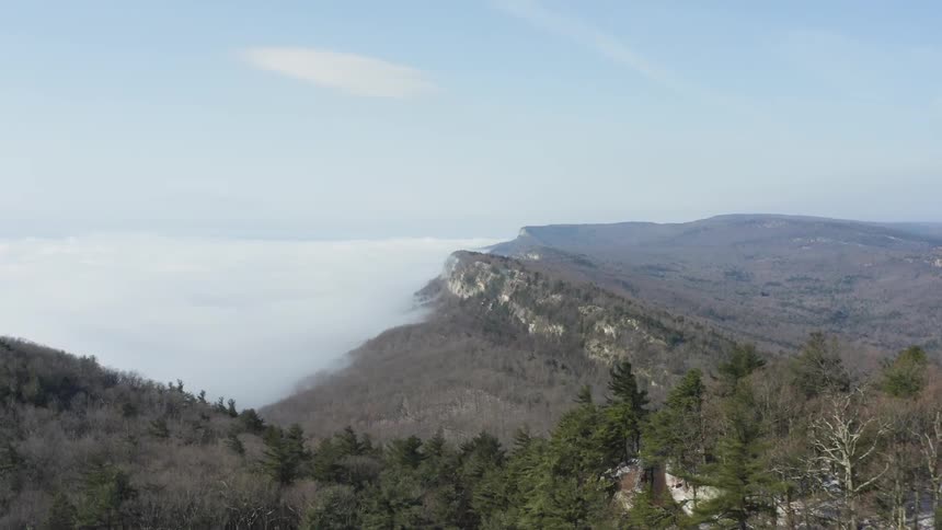 The clouds cover the shore ahead