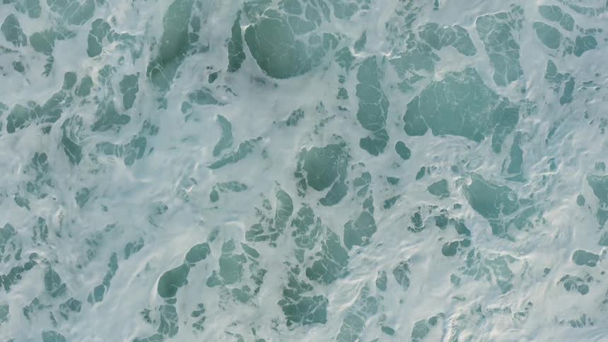 Waves flow and crash in an ocean