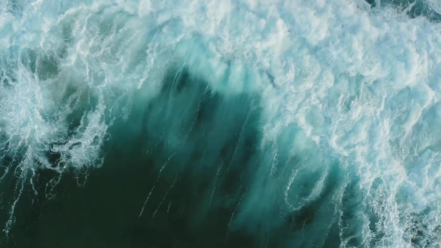Waves crash in an ocean