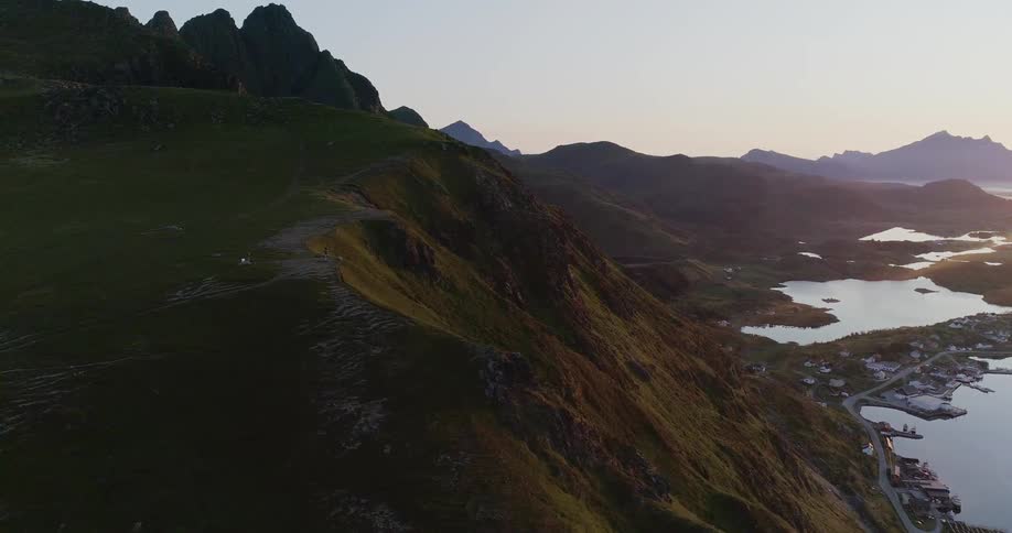 Tall rocky mountains at sunset