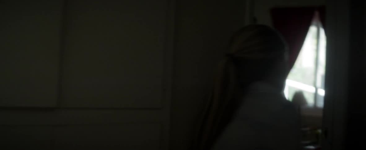 A door is opened by a girl