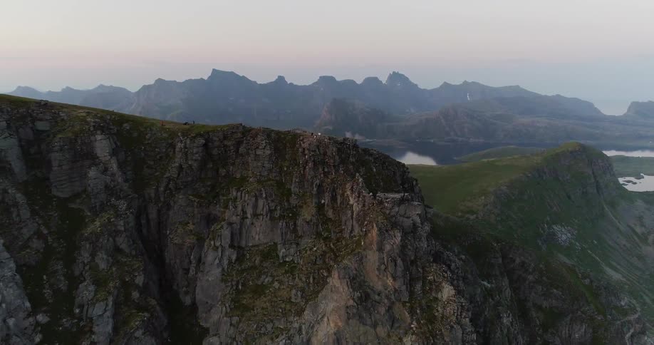 Tall rocky mountains at sunset